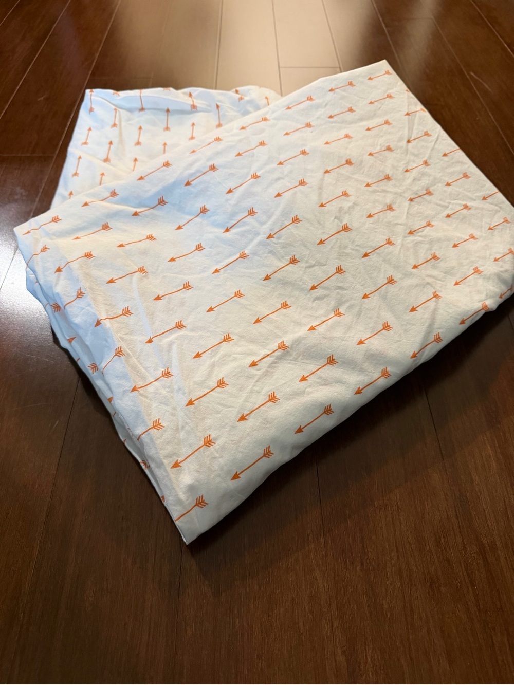 The Land of Nod White Sheet with Orange Arrow Motif